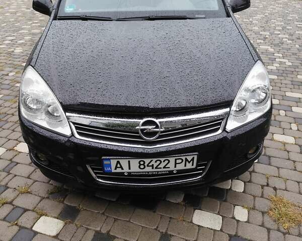 Черный Опель Астра, объемом двигателя 1.6 л и пробегом 237 тыс. км за 4700 $, фото 6 на Automoto.ua