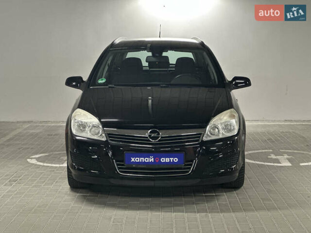 Черный Опель Астра, объемом двигателя 1.6 л и пробегом 216 тыс. км за 5600 $, фото 2 на Automoto.ua