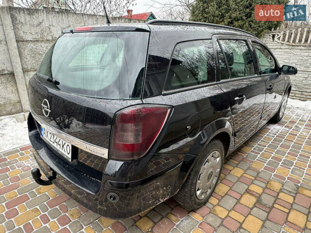 Чорний Опель Астра, об'ємом двигуна 1.6 л та пробігом 220 тис. км за 5899 $, фото 5 на Automoto.ua