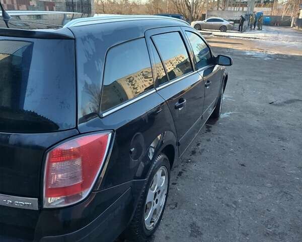 Черный Опель Астра, объемом двигателя 1.9 л и пробегом 294 тыс. км за 4000 $, фото 3 на Automoto.ua