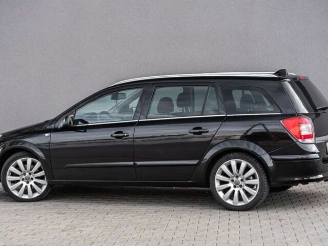 Черный Опель Астра, объемом двигателя 1.9 л и пробегом 300 тыс. км за 2650 $, фото 5 на Automoto.ua