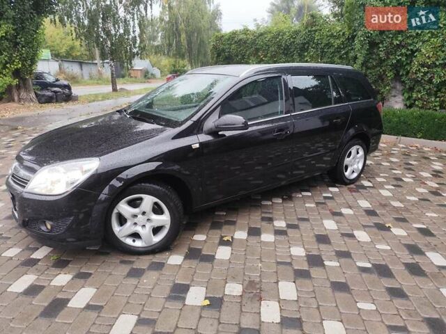 Черный Опель Астра, объемом двигателя 1.6 л и пробегом 237 тыс. км за 4700 $, фото 2 на Automoto.ua