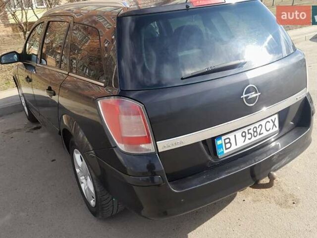 Чорний Опель Астра, об'ємом двигуна 1.6 л та пробігом 207 тис. км за 5400 $, фото 1 на Automoto.ua