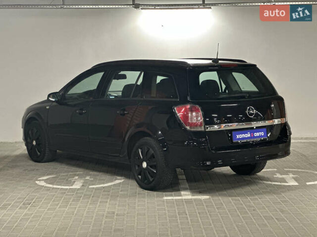 Черный Опель Астра, объемом двигателя 1.6 л и пробегом 216 тыс. км за 5600 $, фото 5 на Automoto.ua