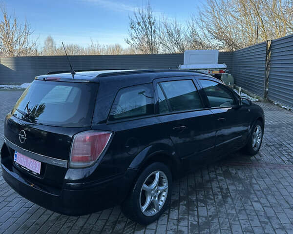 Черный Опель Астра, объемом двигателя 1.6 л и пробегом 228 тыс. км за 4400 $, фото 6 на Automoto.ua