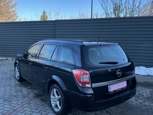 Черный Опель Астра, объемом двигателя 1.6 л и пробегом 228 тыс. км за 4400 $, фото 3 на Automoto.ua