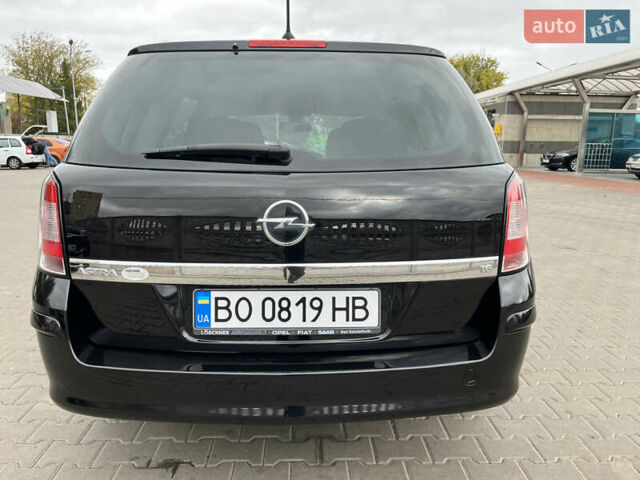 Черный Опель Астра, объемом двигателя 1.6 л и пробегом 223 тыс. км за 5750 $, фото 10 на Automoto.ua