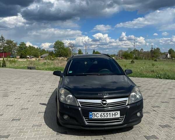 Черный Опель Астра, объемом двигателя 1.91 л и пробегом 242 тыс. км за 4500 $, фото 2 на Automoto.ua