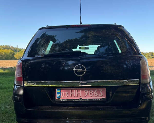 Черный Опель Астра, объемом двигателя 1.6 л и пробегом 228 тыс. км за 4550 $, фото 21 на Automoto.ua
