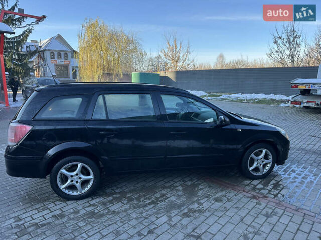 Черный Опель Астра, объемом двигателя 1.6 л и пробегом 228 тыс. км за 4400 $, фото 4 на Automoto.ua