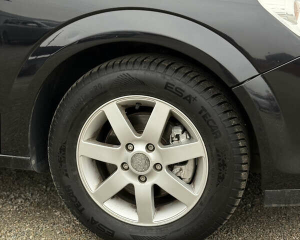 Черный Опель Астра, объемом двигателя 1.7 л и пробегом 230 тыс. км за 4800 $, фото 4 на Automoto.ua