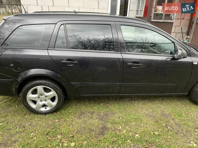 Черный Опель Астра, объемом двигателя 1.6 л и пробегом 272 тыс. км за 5100 $, фото 4 на Automoto.ua