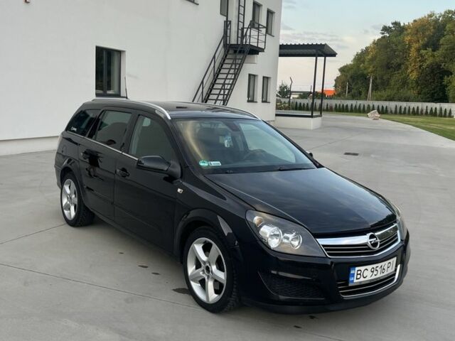 Черный Опель Астра, объемом двигателя 1.9 л и пробегом 270 тыс. км за 5200 $, фото 6 на Automoto.ua