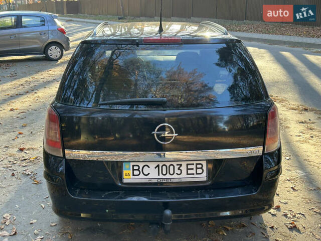 Чорний Опель Астра, об'ємом двигуна 1.3 л та пробігом 297 тис. км за 3999 $, фото 8 на Automoto.ua