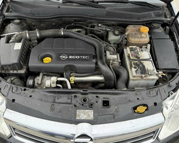 Черный Опель Астра, объемом двигателя 1.7 л и пробегом 230 тыс. км за 4800 $, фото 21 на Automoto.ua