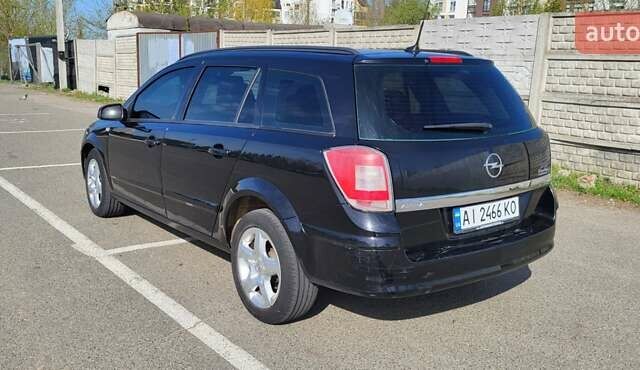 Черный Опель Астра, объемом двигателя 1.6 л и пробегом 319 тыс. км за 4500 $, фото 7 на Automoto.ua