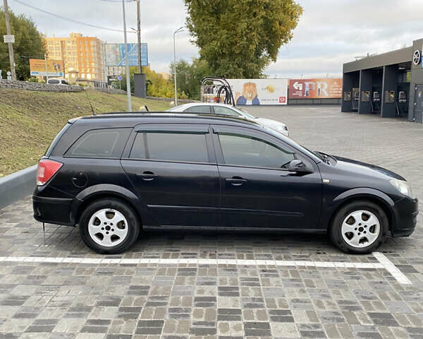 Чорний Опель Астра, об'ємом двигуна 1.25 л та пробігом 202 тис. км за 4500 $, фото 4 на Automoto.ua