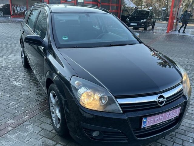 Черный Опель Астра, объемом двигателя 1.6 л и пробегом 228 тыс. км за 4400 $, фото 1 на Automoto.ua