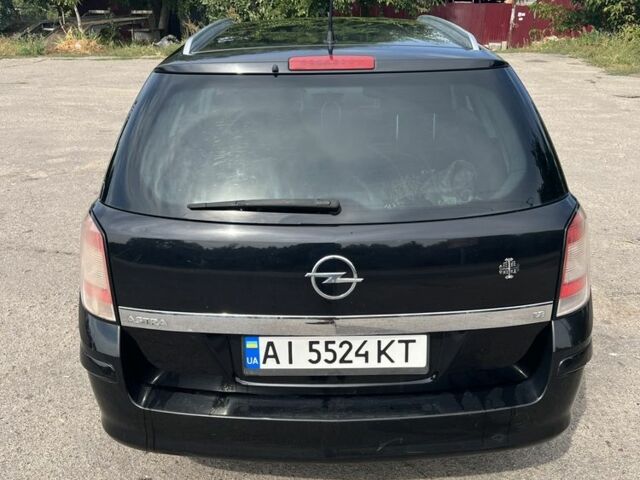 Чорний Опель Астра, об'ємом двигуна 1.8 л та пробігом 271 тис. км за 4700 $, фото 2 на Automoto.ua