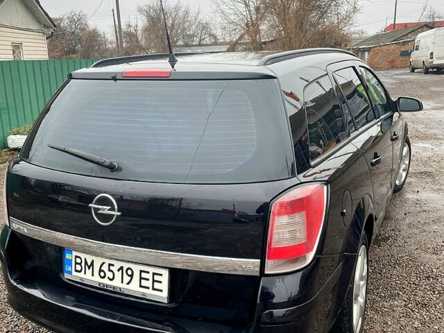 Черный Опель Астра, объемом двигателя 1.6 л и пробегом 245 тыс. км за 5400 $, фото 3 на Automoto.ua