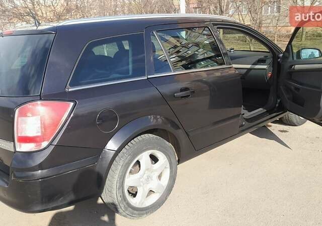 Чорний Опель Астра, об'ємом двигуна 1.6 л та пробігом 207 тис. км за 5400 $, фото 3 на Automoto.ua
