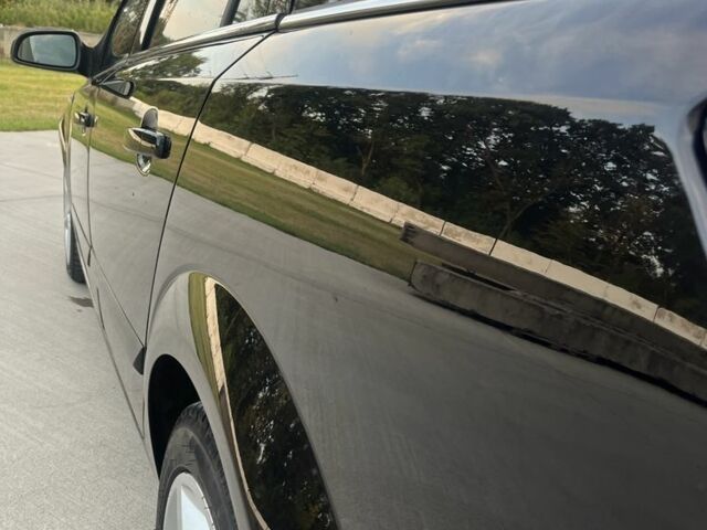 Черный Опель Астра, объемом двигателя 1.9 л и пробегом 270 тыс. км за 5200 $, фото 9 на Automoto.ua