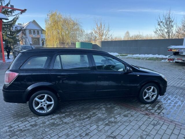 Черный Опель Астра, объемом двигателя 1.6 л и пробегом 228 тыс. км за 4400 $, фото 2 на Automoto.ua