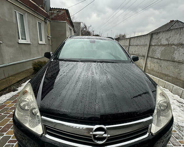 Чорний Опель Астра, об'ємом двигуна 1.6 л та пробігом 220 тис. км за 5899 $, фото 1 на Automoto.ua