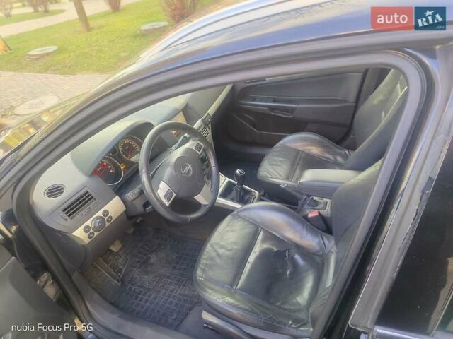 Черный Опель Астра, объемом двигателя 1.6 л и пробегом 281 тыс. км за 5150 $, фото 7 на Automoto.ua