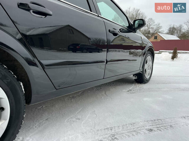 Чорний Опель Астра, об'ємом двигуна 1.6 л та пробігом 243 тис. км за 4750 $, фото 11 на Automoto.ua