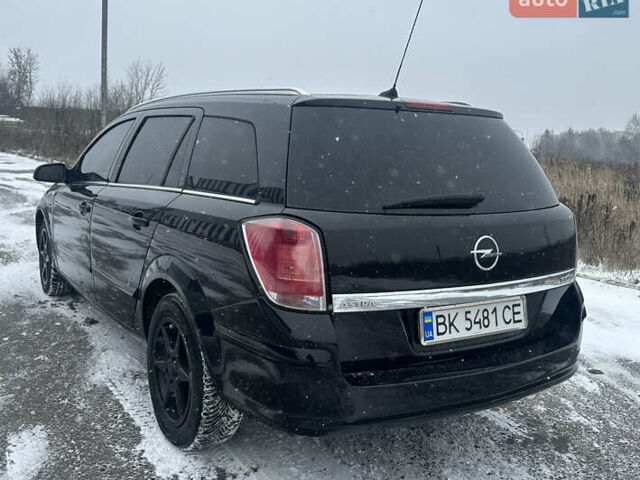 Черный Опель Астра, объемом двигателя 1.9 л и пробегом 370 тыс. км за 4250 $, фото 4 на Automoto.ua