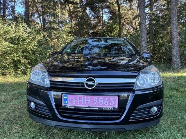 Черный Опель Астра, объемом двигателя 1.6 л и пробегом 228 тыс. км за 4450 $, фото 1 на Automoto.ua