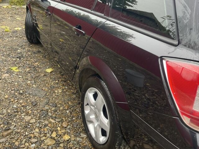 Черный Опель Астра, объемом двигателя 1.6 л и пробегом 245 тыс. км за 5300 $, фото 1 на Automoto.ua