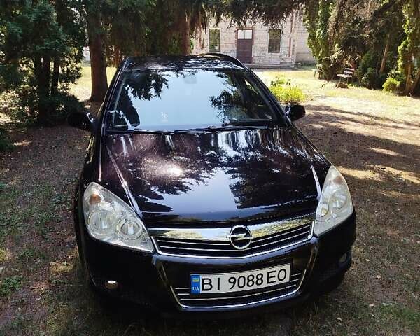 Черный Опель Астра, объемом двигателя 1.6 л и пробегом 228 тыс. км за 5800 $, фото 6 на Automoto.ua