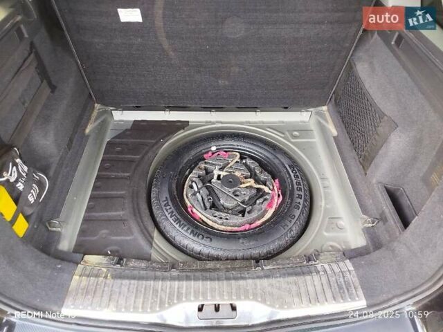 Черный Опель Астра, объемом двигателя 1.6 л и пробегом 228 тыс. км за 5800 $, фото 11 на Automoto.ua