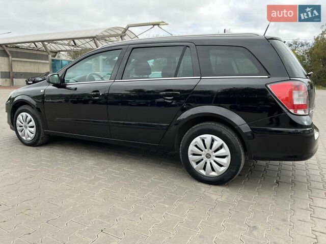 Черный Опель Астра, объемом двигателя 1.6 л и пробегом 223 тыс. км за 5750 $, фото 4 на Automoto.ua