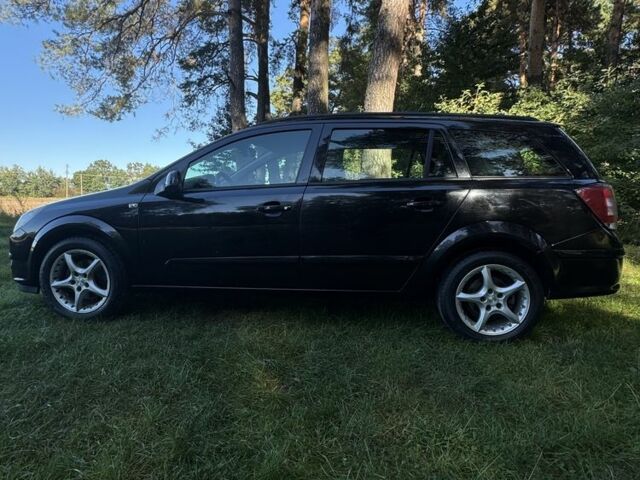 Черный Опель Астра, объемом двигателя 1.6 л и пробегом 228 тыс. км за 4450 $, фото 2 на Automoto.ua