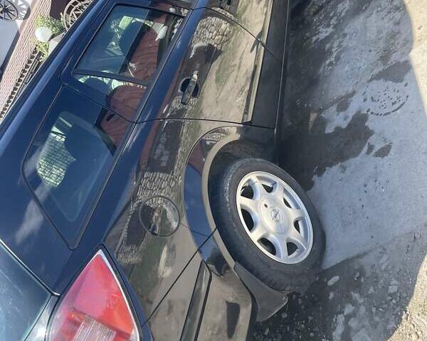 Черный Опель Астра, объемом двигателя 1.91 л и пробегом 310 тыс. км за 5050 $, фото 3 на Automoto.ua