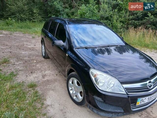 Черный Опель Астра, объемом двигателя 1.3 л и пробегом 296 тыс. км за 4350 $, фото 2 на Automoto.ua