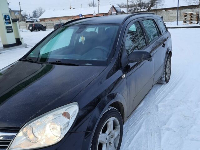 Черный Опель Астра, объемом двигателя 1.6 л и пробегом 240 тыс. км за 4350 $, фото 4 на Automoto.ua