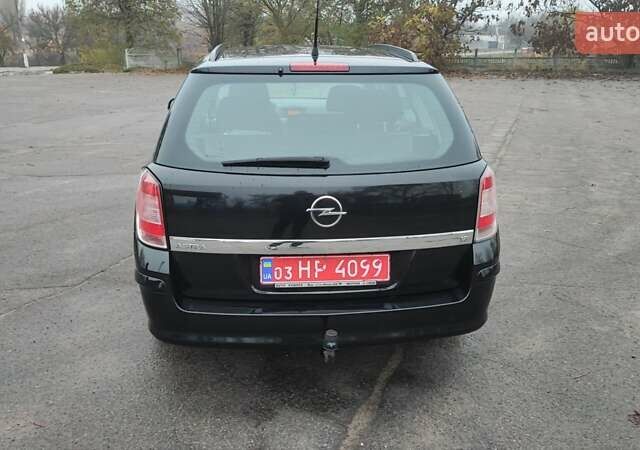 Черный Опель Астра, объемом двигателя 1.82 л и пробегом 204 тыс. км за 5950 $, фото 1 на Automoto.ua