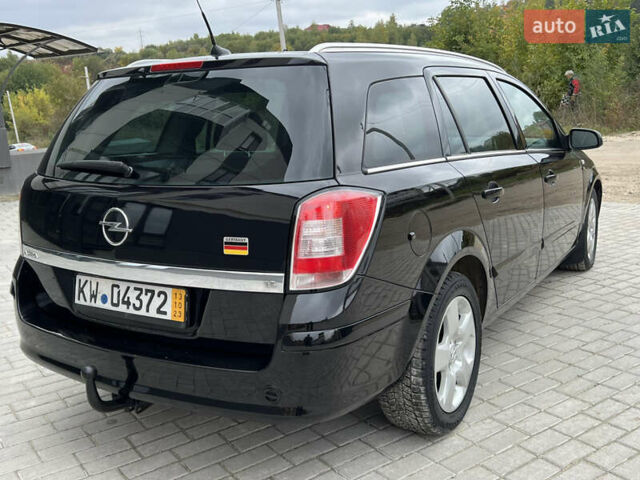Черный Опель Астра, объемом двигателя 1.6 л и пробегом 250 тыс. км за 4399 $, фото 13 на Automoto.ua
