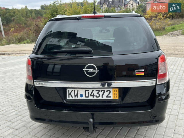 Черный Опель Астра, объемом двигателя 1.6 л и пробегом 250 тыс. км за 4399 $, фото 12 на Automoto.ua