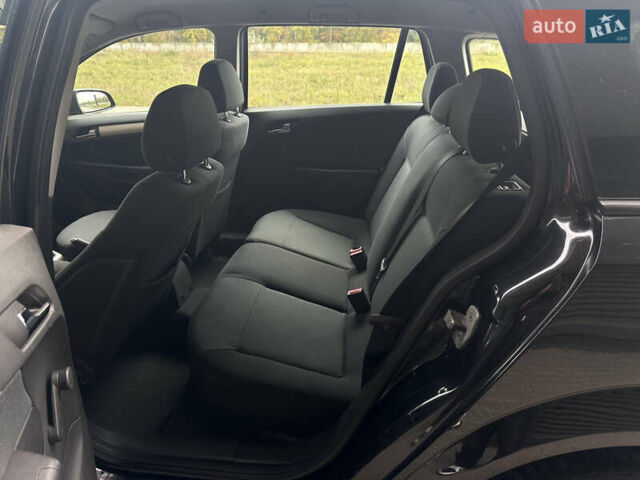 Черный Опель Астра, объемом двигателя 1.6 л и пробегом 216 тыс. км за 5600 $, фото 10 на Automoto.ua