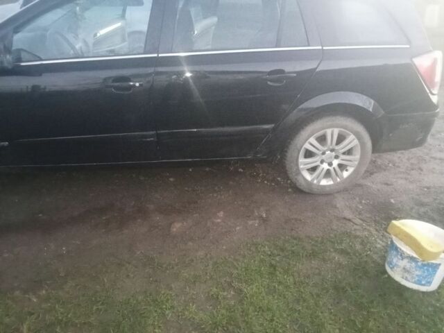 Черный Опель Астра, объемом двигателя 1.7 л и пробегом 199 тыс. км за 3700 $, фото 11 на Automoto.ua