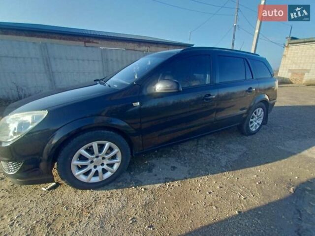 Черный Опель Астра, объемом двигателя 1.6 л и пробегом 290 тыс. км за 6200 $, фото 6 на Automoto.ua