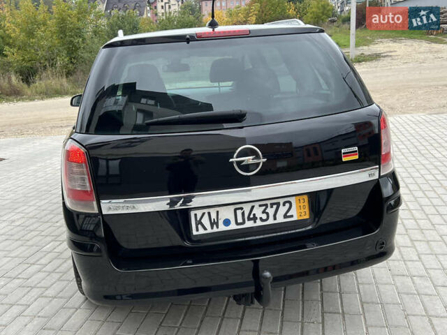 Черный Опель Астра, объемом двигателя 1.6 л и пробегом 250 тыс. км за 4399 $, фото 11 на Automoto.ua