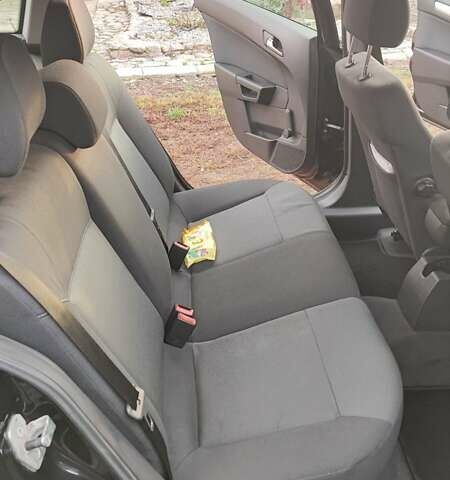 Черный Опель Астра, объемом двигателя 1.82 л и пробегом 204 тыс. км за 5950 $, фото 7 на Automoto.ua