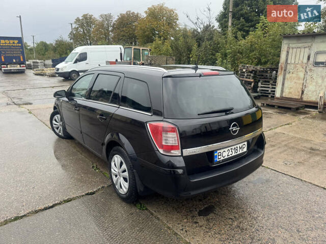 Черный Опель Астра, объемом двигателя 1.69 л и пробегом 300 тыс. км за 4500 $, фото 15 на Automoto.ua