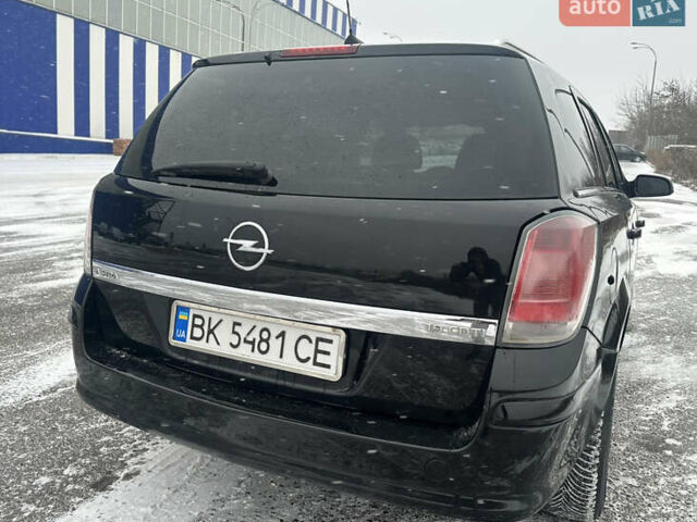 Черный Опель Астра, объемом двигателя 1.9 л и пробегом 370 тыс. км за 4250 $, фото 6 на Automoto.ua
